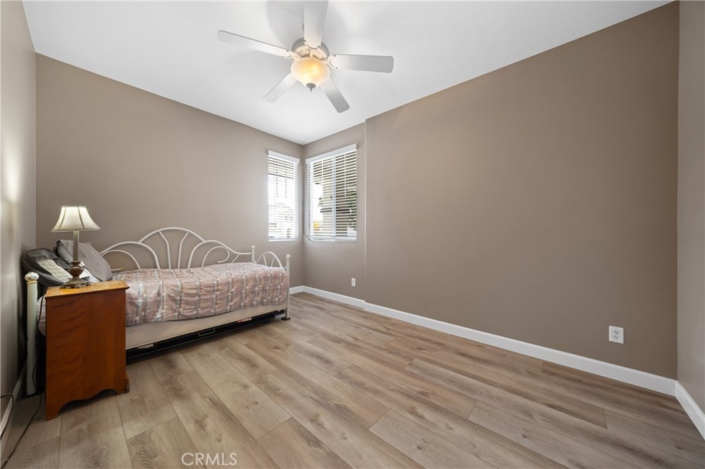 40889 Robards Way Murrieta, CA 92562 - Photo 25 of 36 a living room with furniture and a window