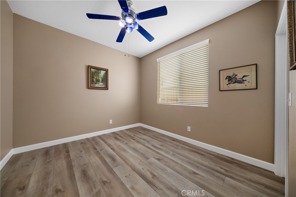 40889 Robards Way Murrieta, CA 92562 - Photo 27 of 36 an empty room with windows and fan