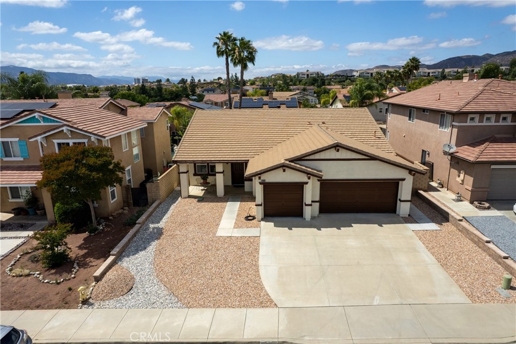 40889 Robards Way Murrieta, CA 92562 - Photo 30 of 36 a aerial view of a house with a yard