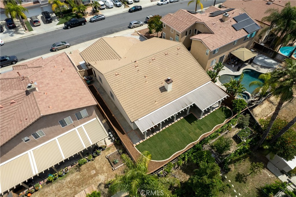 40889 Robards Way Murrieta, CA 92562 - Photo 33 of 36 an aerial view of a tennis ground with a large tree