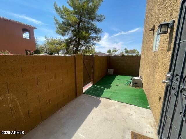 16225 North 30th Street, Unit 9 Phoenix, AZ 85032 - Photo 14 of 19 a view of a backyard