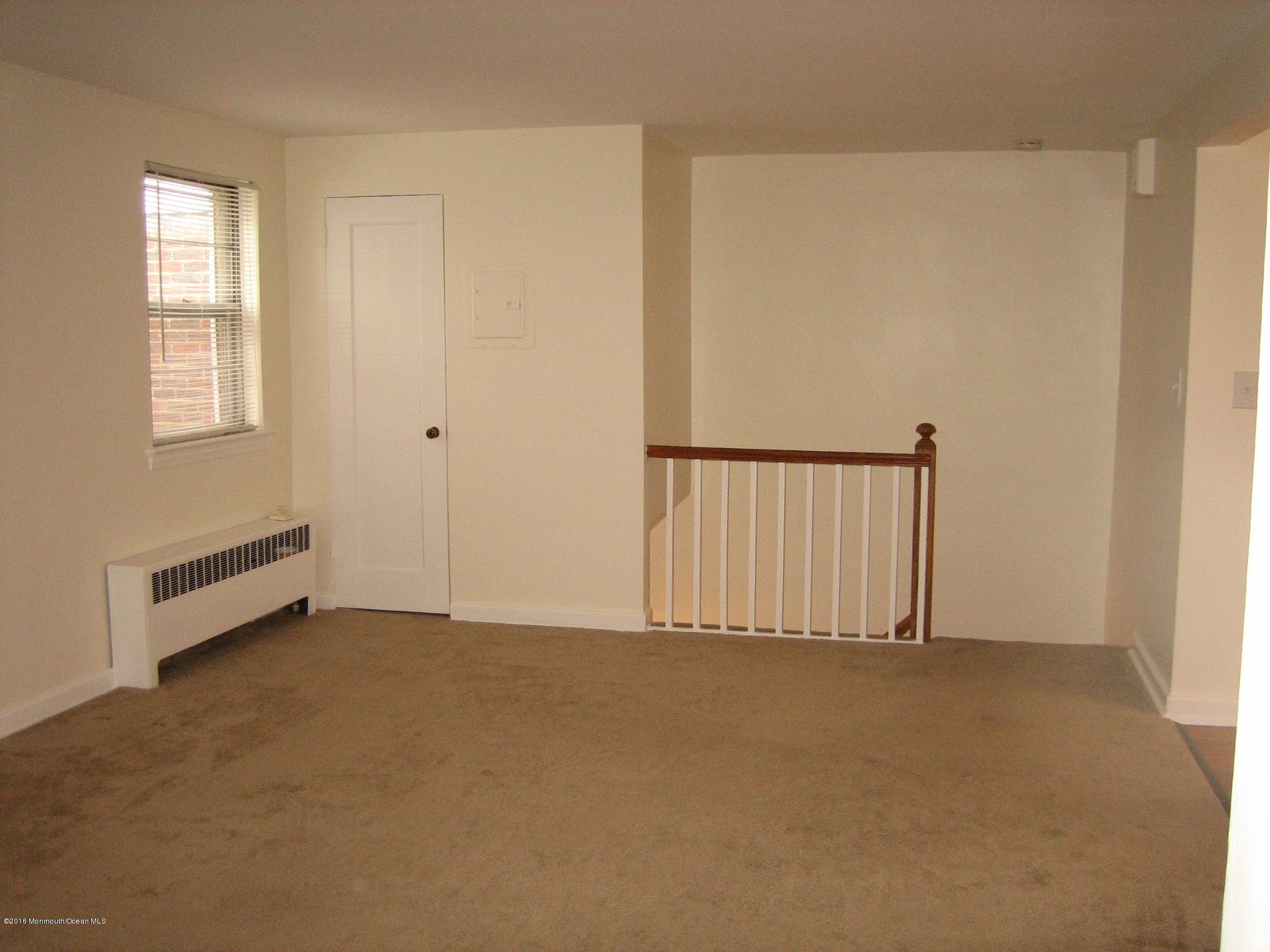169 Manor Drive Red Bank, NJ 07701 - Photo 2 of 12 a view of an empty room with a window