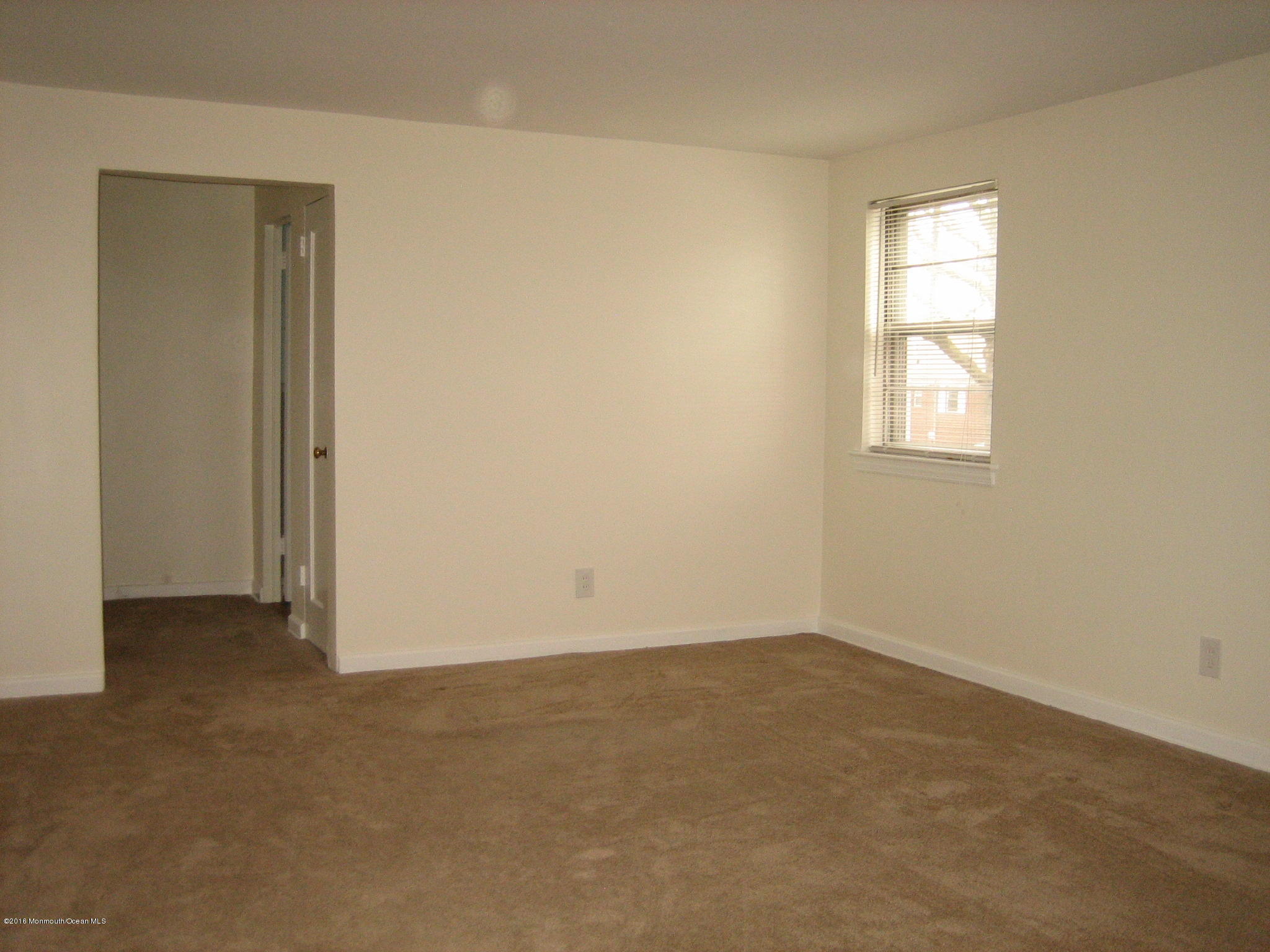 169 Manor Drive Red Bank, NJ 07701 - Photo 3 of 12 an empty room with a window