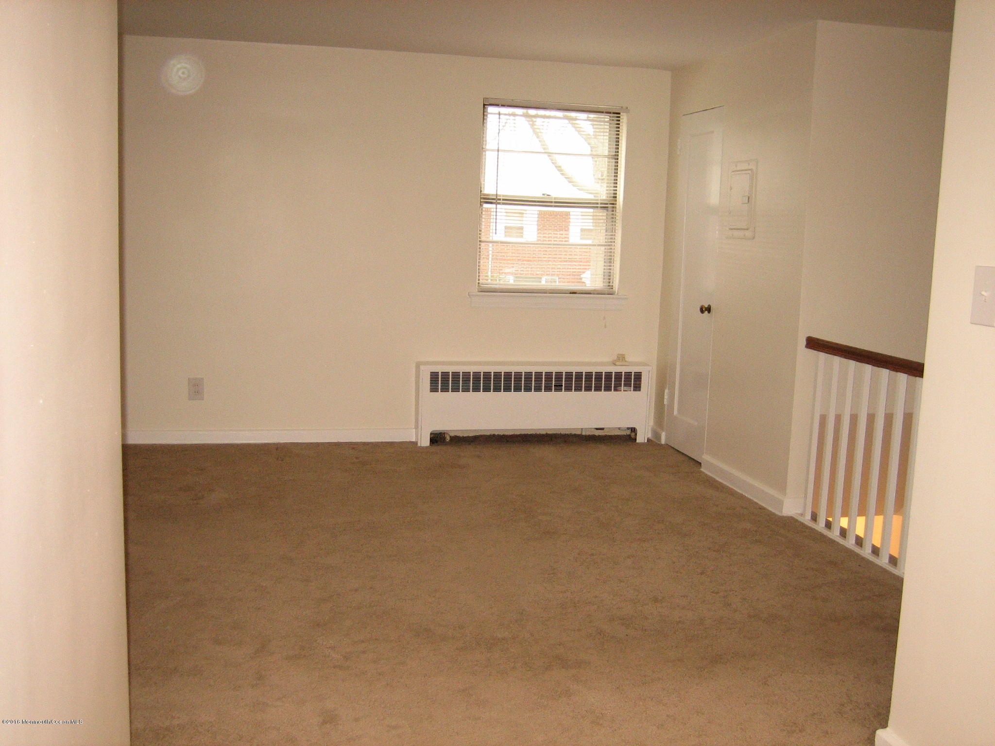 169 Manor Drive Red Bank, NJ 07701 - Photo 4 of 12 an empty room with windows