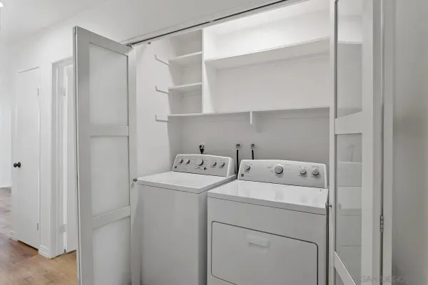 a utility room with dryer and washer