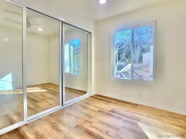 a view of an empty room and window