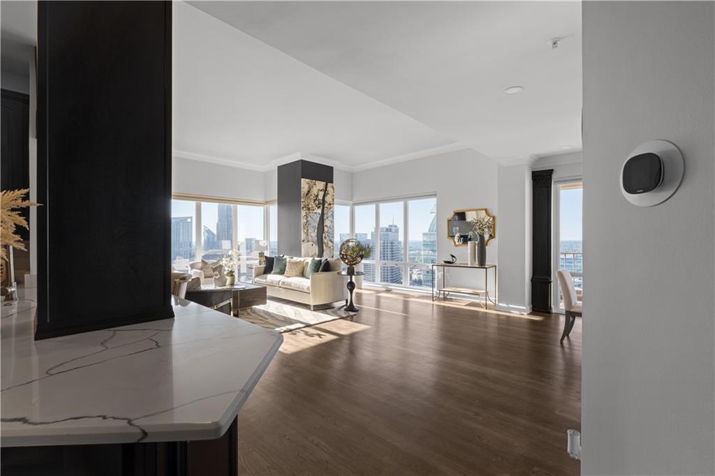3475 Oak Valley Road Northeast, Unit 2820 Atlanta, GA 30326 - Photo 12 of 86 a living room with fireplace furniture and a large window