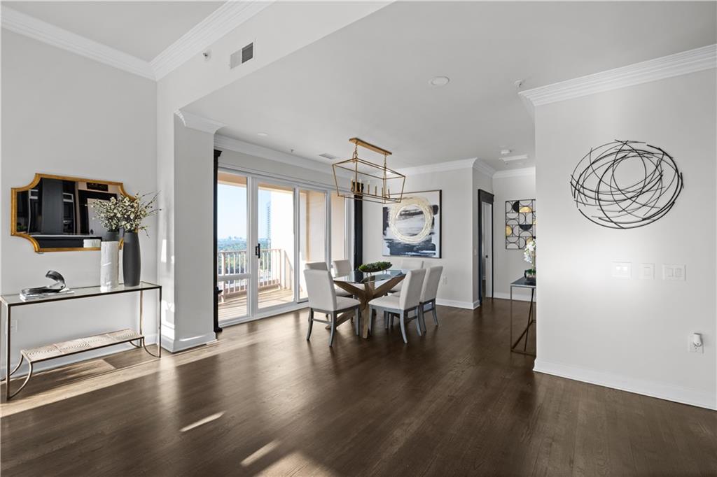 3475 Oak Valley Road Northeast, Unit 2820 Atlanta, GA 30326 - Photo 21 of 86 a view of a room with furniture window and wooden floor