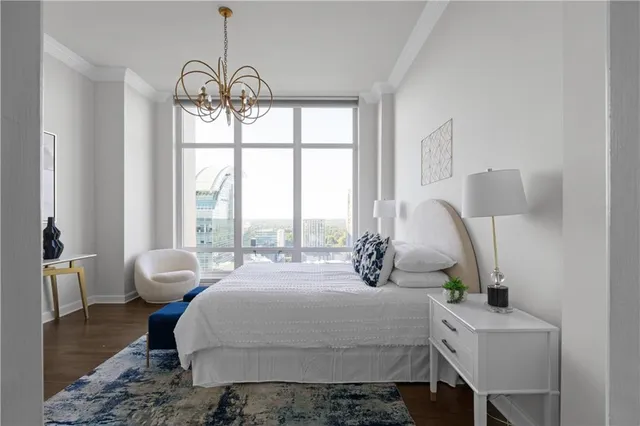 a kitchen with a stove a refrigerator and a microwave