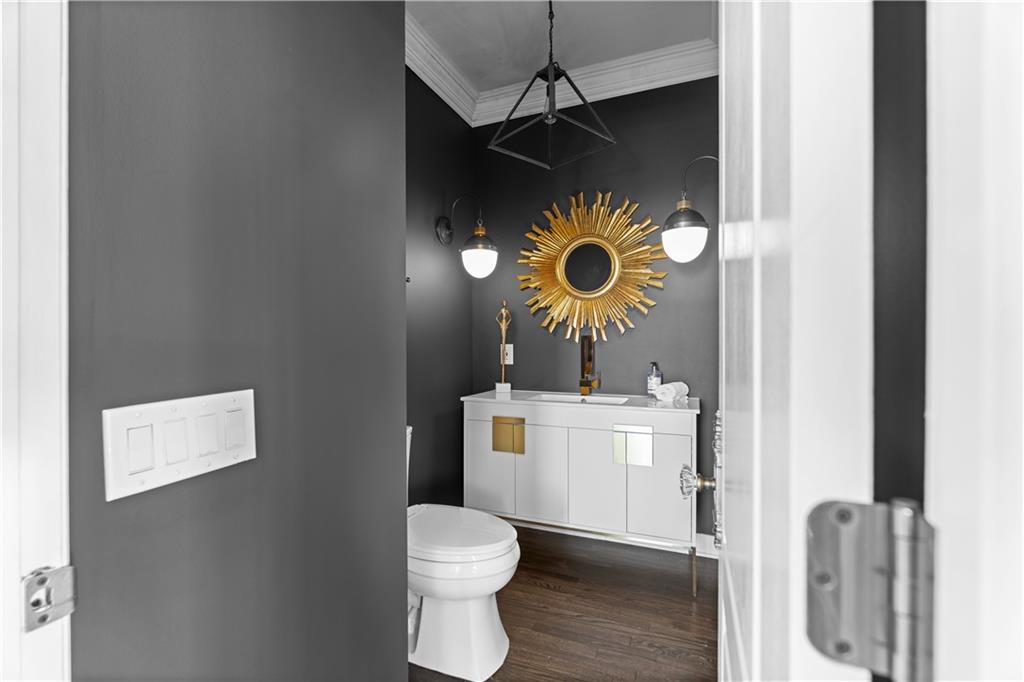 3475 Oak Valley Road Northeast, Unit 2820 Atlanta, GA 30326 - Photo 33 of 86 a bathroom with a toilet and a sink