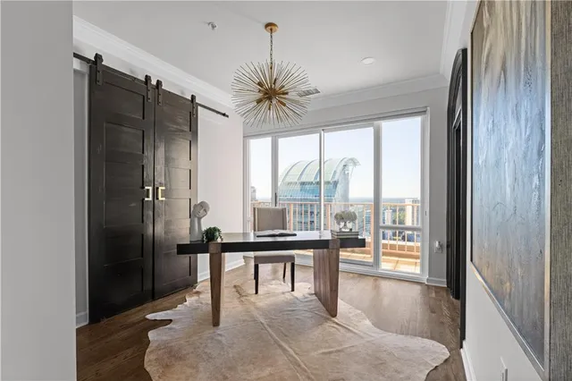 a front view of a building with garden