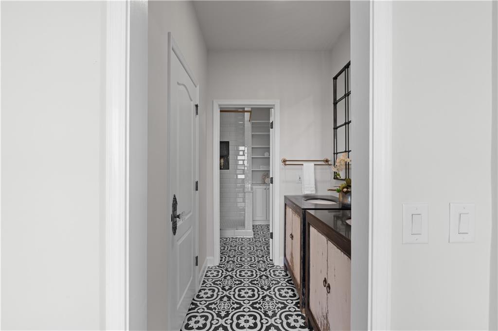 3475 Oak Valley Road Northeast, Unit 2820 Atlanta, GA 30326 - Photo 42 of 86 a kitchen with a stove a refrigerator and a microwave