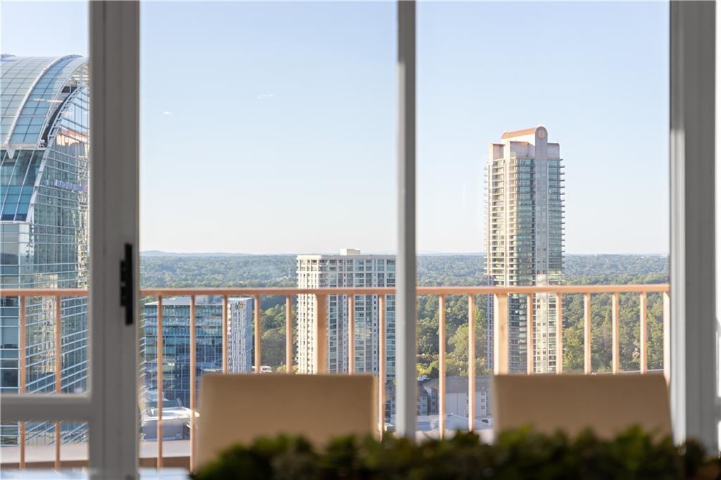 3475 Oak Valley Road Northeast, Unit 2820 Atlanta, GA 30326 - Photo 57 of 86 a view of roof deck with large windows and lake view