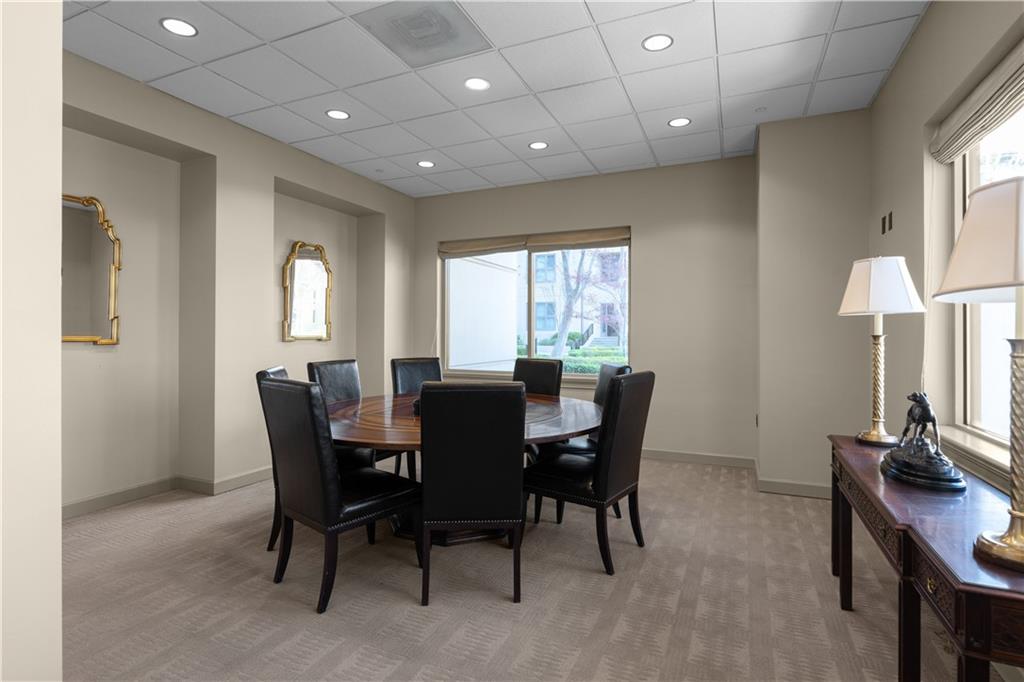 3475 Oak Valley Road Northeast, Unit 2820 Atlanta, GA 30326 - Photo 70 of 86 a view of a dining room with furniture