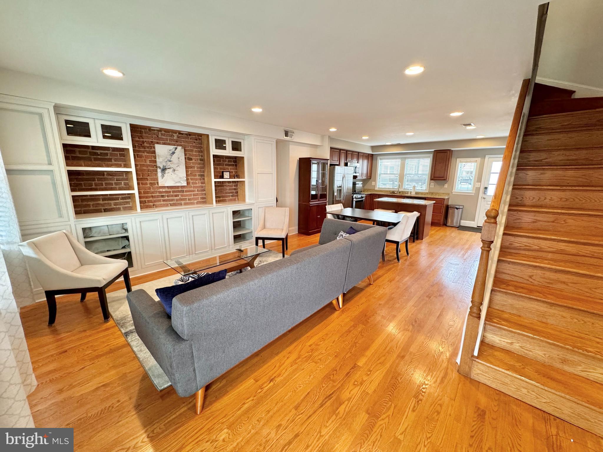1334 Queen Street Northeast Washington, DC 20002 - Photo 4 of 37 Sun-filled living room w/ custom built-ins