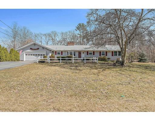 107 Oak Street Middleboro, MA 02346 - Photo 1 of 24 a front view of a house with a yard