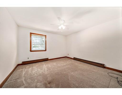 107 Oak Street Middleboro, MA 02346 - Photo 14 of 24 a view of an empty room and a window
