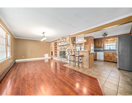 107 Oak Street Middleboro, MA 02346 - Photo 8 of 24 a view interior of a kitchen with refrigerator and windows