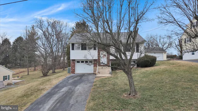 a terrace of a house with outdoor seating
