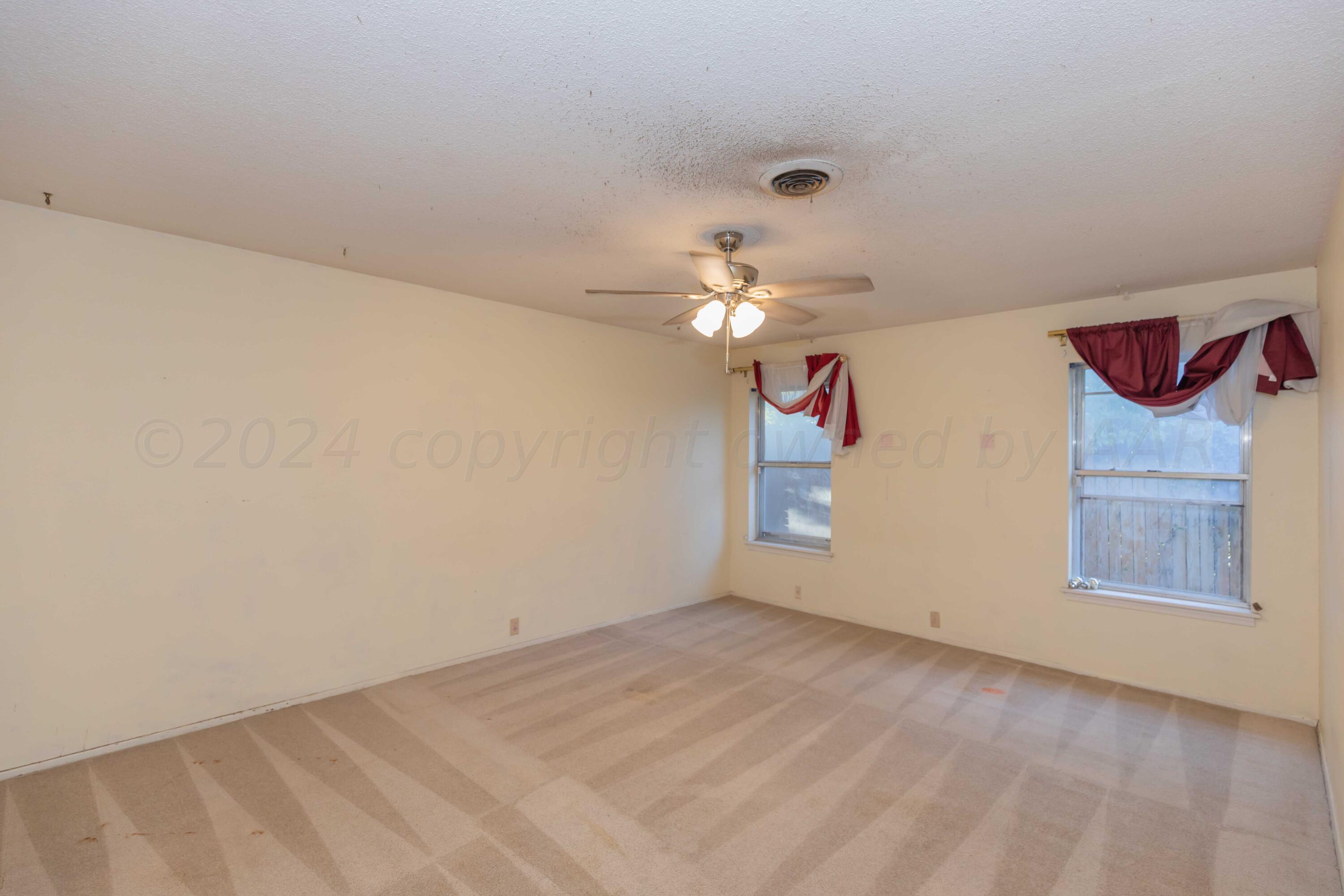 4721 Shawnee Trail Amarillo, TX 79109 - Photo 13 of 52 wooden floor in an empty room