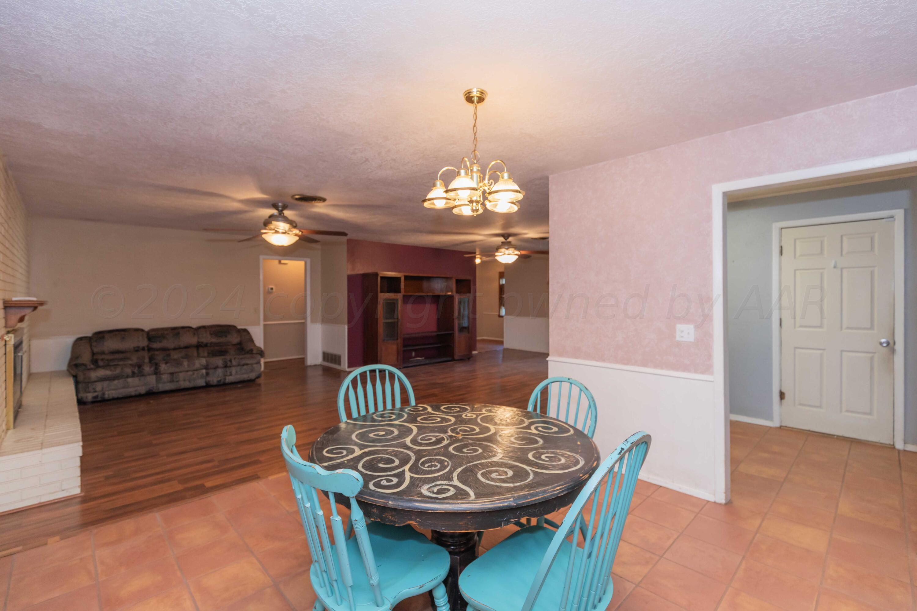 4721 Shawnee Trail Amarillo, TX 79109 - Photo 25 of 52 a view of a dining room with furniture
