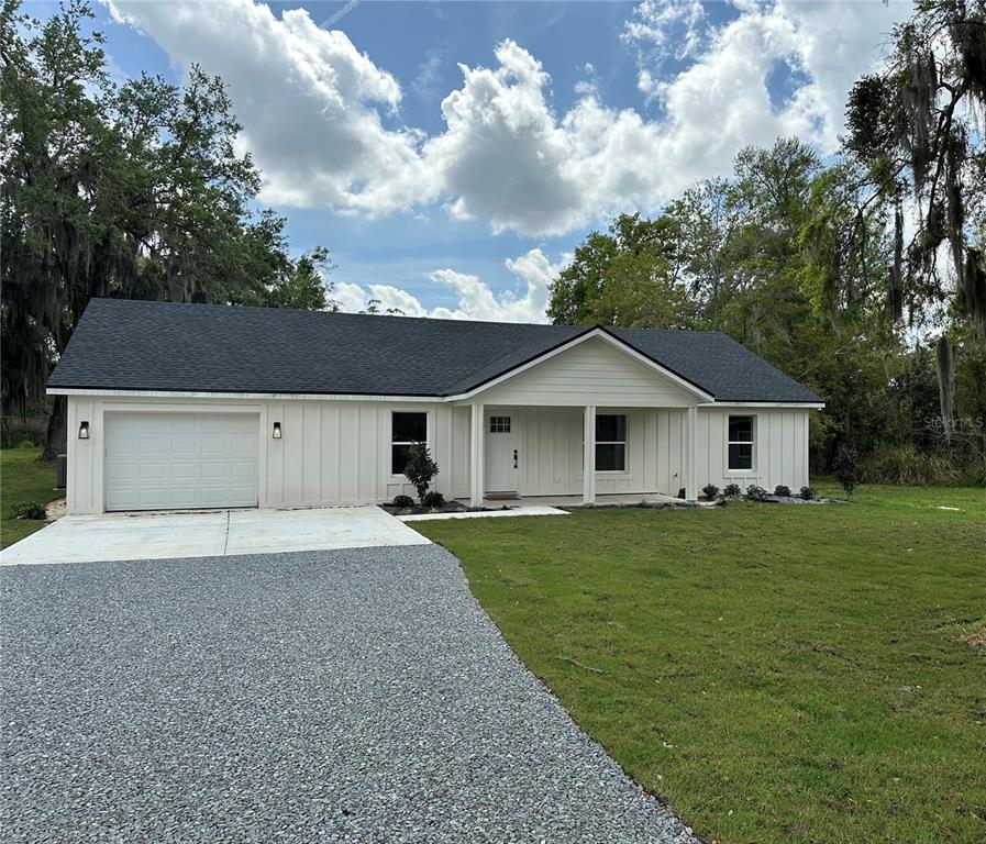 2534 Prine Road Lakeland, FL 33810 - Photo 1 of 1 a front view of house with yard and green space