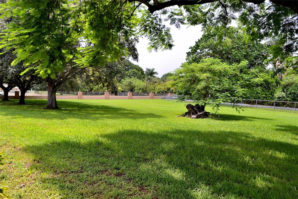 6200 Southwest 183rd Way Southwest Ranches, FL 33331 - Photo 15 of 18 a view of field with trees in the background
