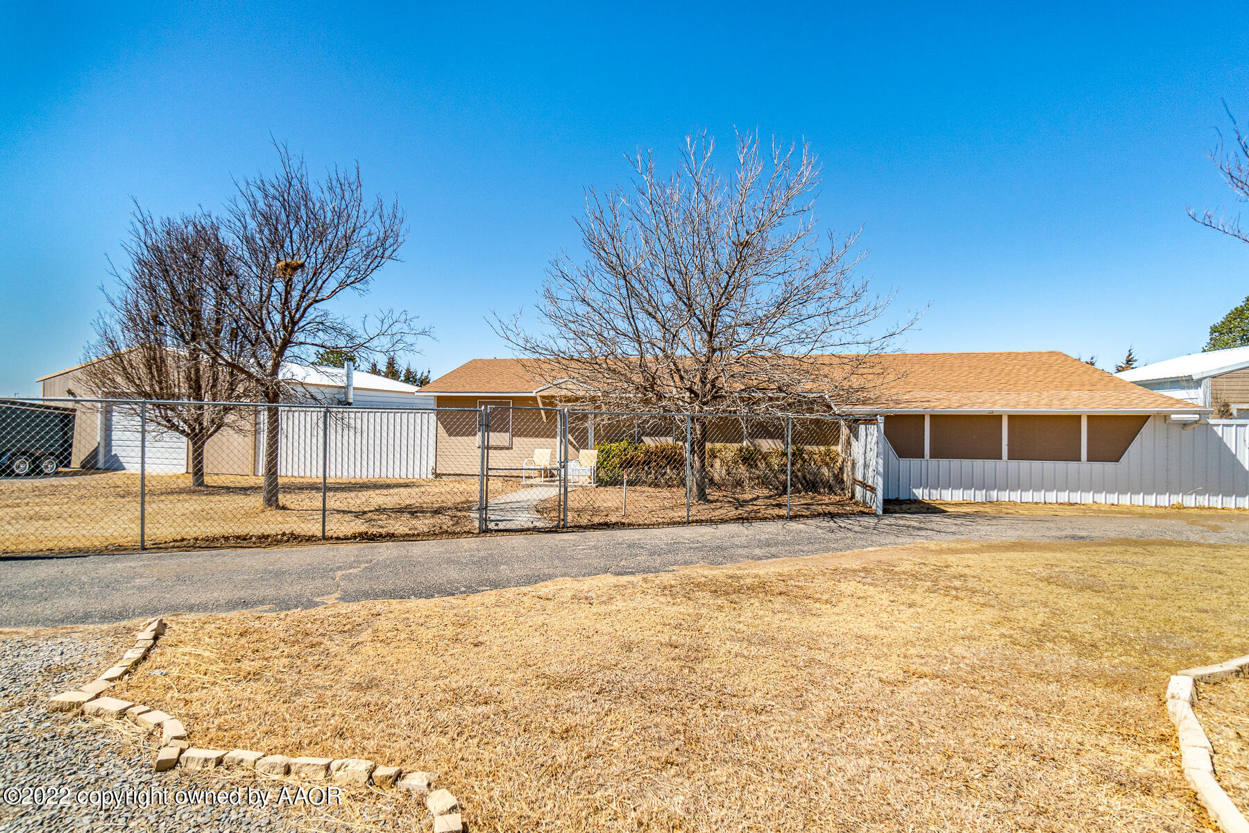 23350 Brown Road Canyon, TX 79015 - Photo 12 of 50 a view of a house with a yard