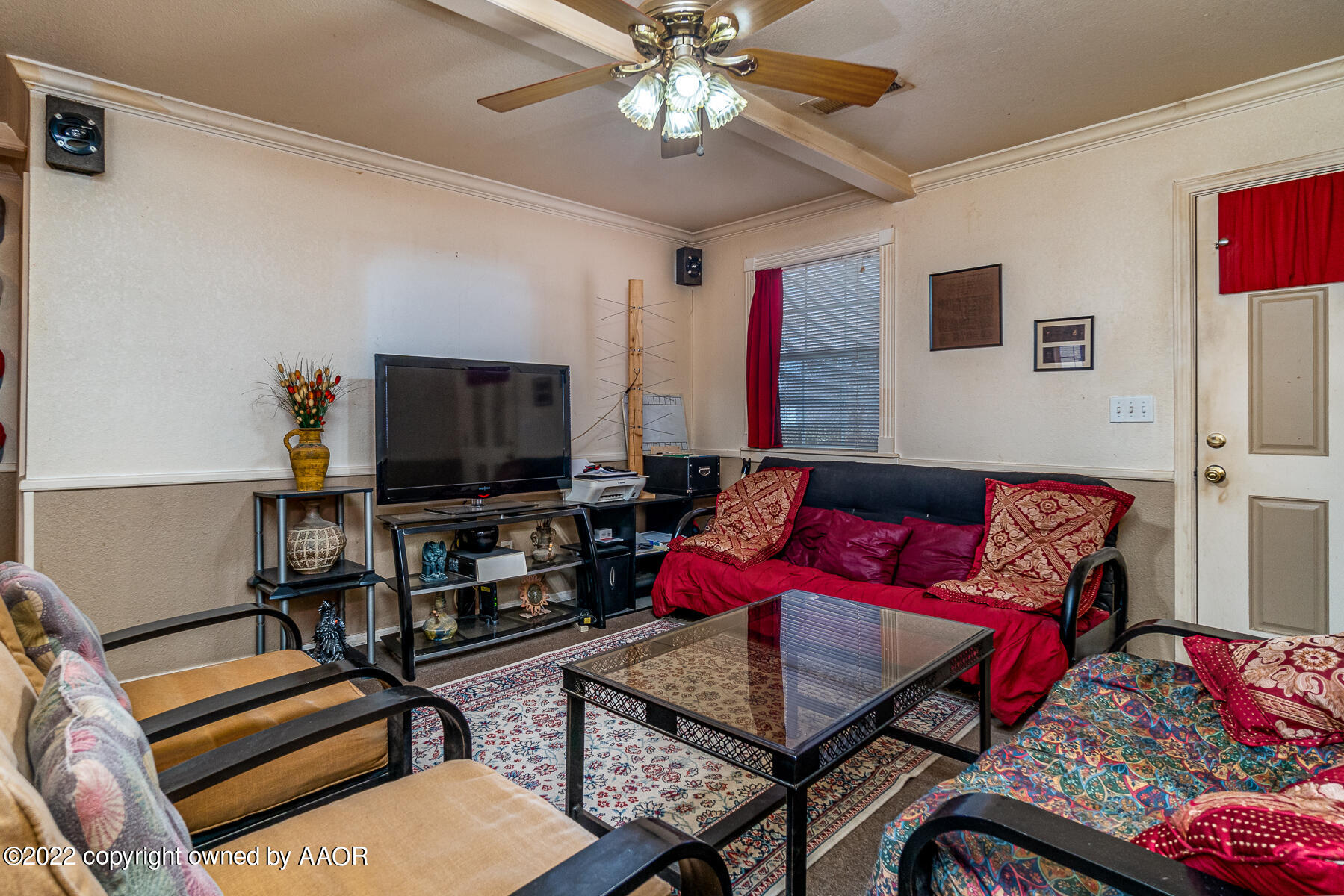 23350 Brown Road Canyon, TX 79015 - Photo 15 of 50 a living room with furniture and a flat screen tv