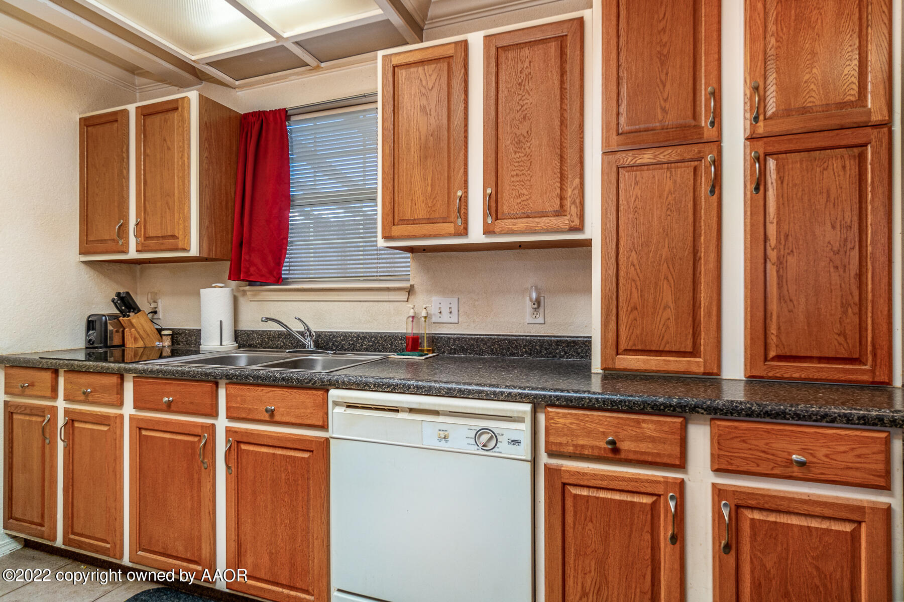 23350 Brown Road Canyon, TX 79015 - Photo 20 of 50 a kitchen with stainless steel appliances granite countertop a refrigerator and cabinets