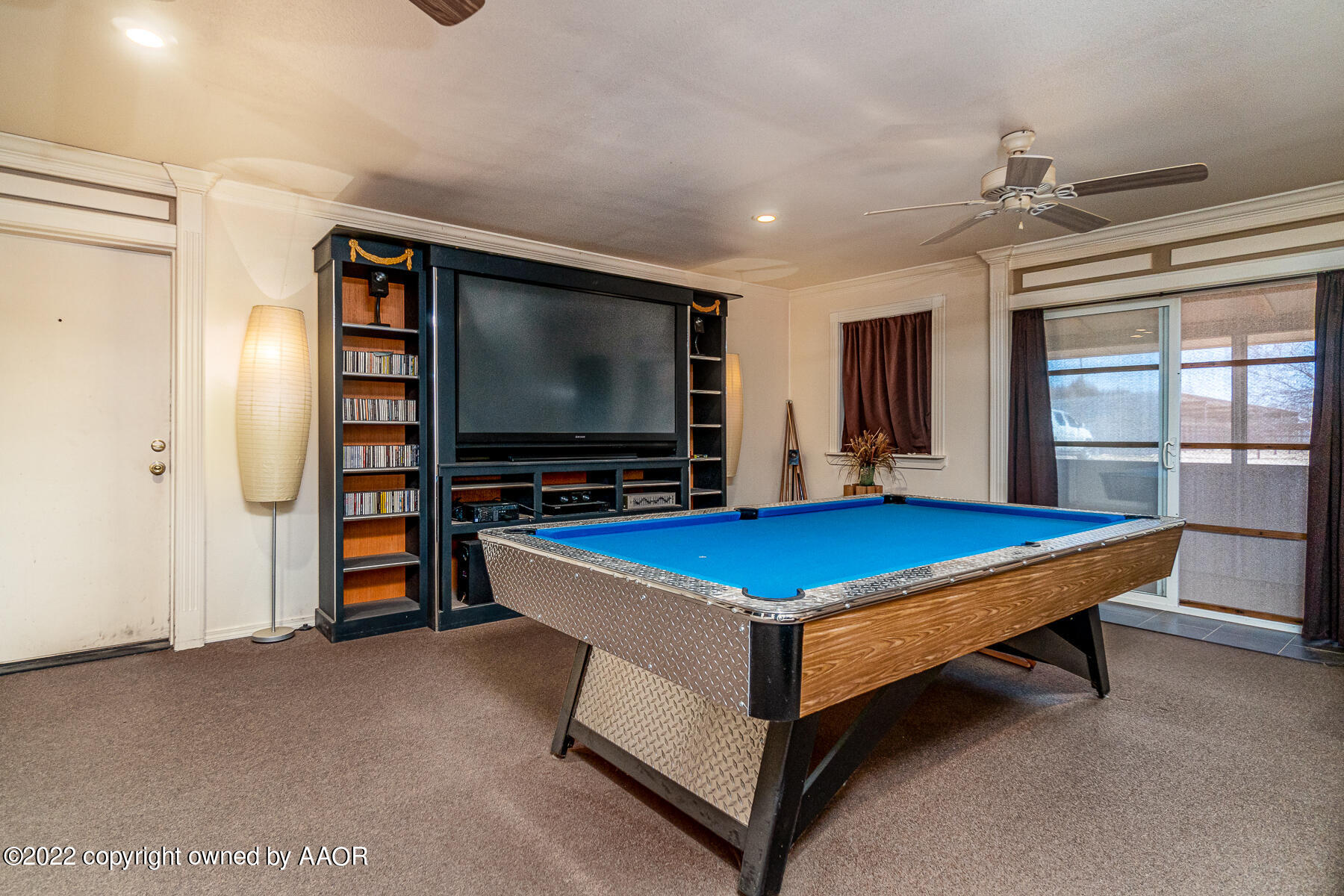 23350 Brown Road Canyon, TX 79015 - Photo 22 of 50 a room with pool table flat screen tv and windows