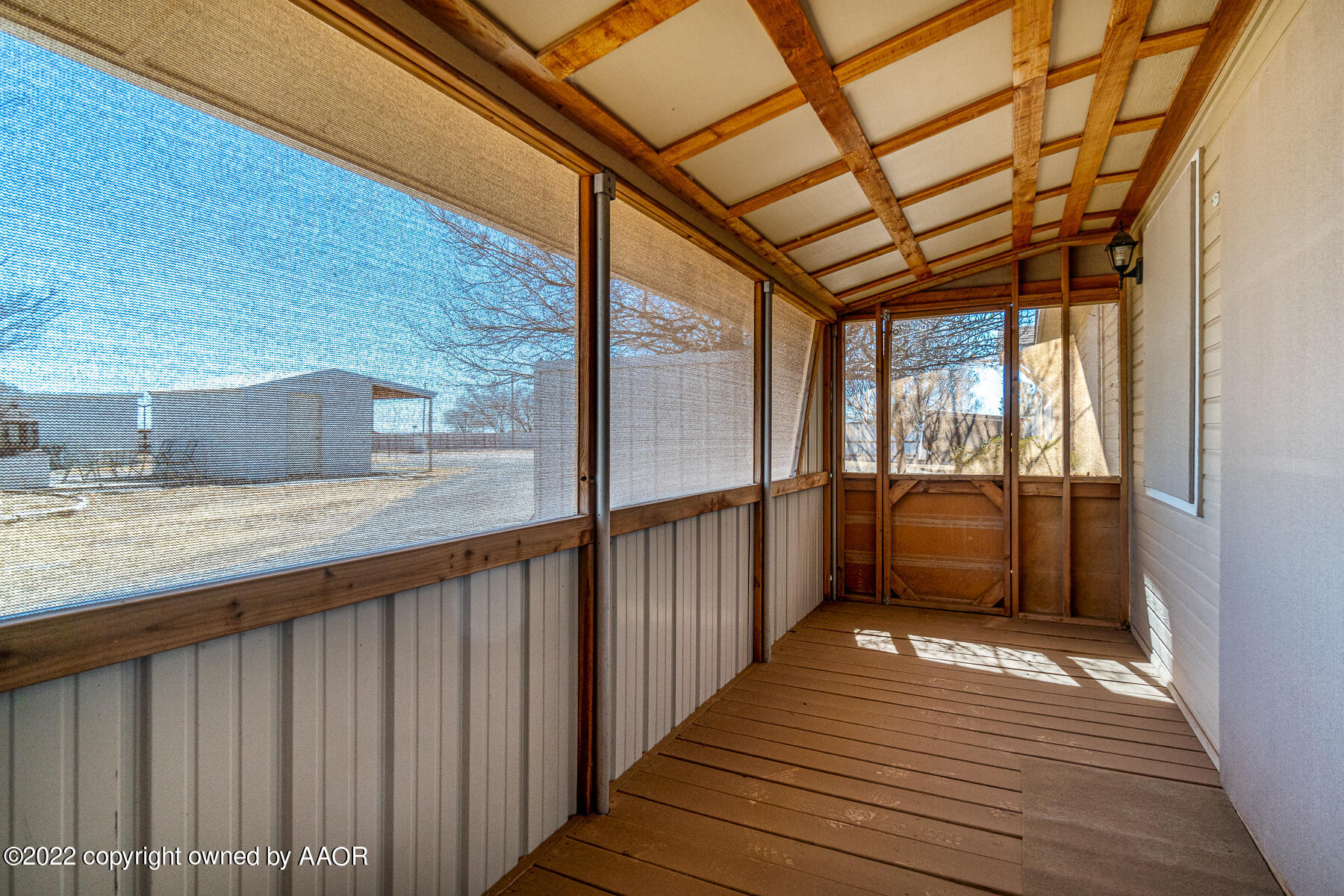 23350 Brown Road Canyon, TX 79015 - Photo 31 of 50 a view of a balcony with wooden floor and iron stairs