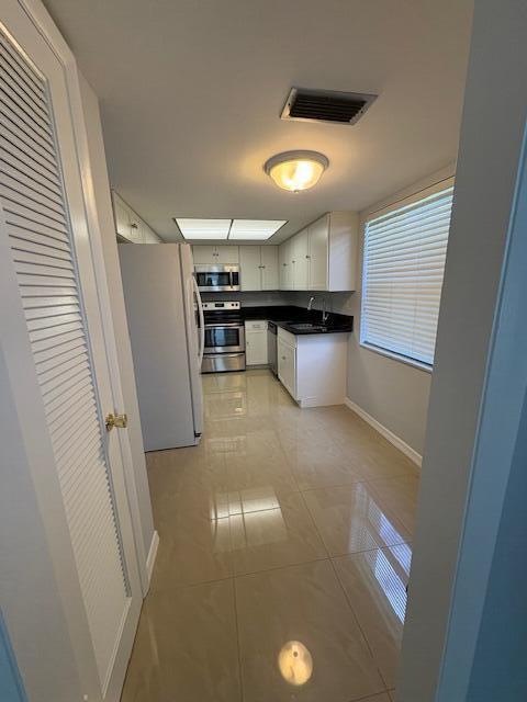 2936 Lake Shore Drive, Unit 101 Riviera Beach, FL 33404 - Photo 24 of 37 IMG_1651