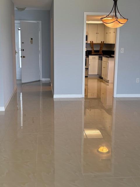 2936 Lake Shore Drive, Unit 101 Riviera Beach, FL 33404 - Photo 3 of 37 IMG_1632