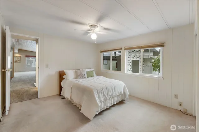 a bathroom with a shower and a sink