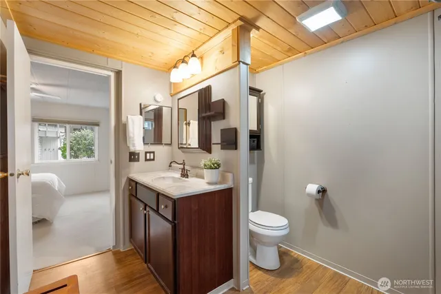 a utility room with cabinets washer and dryer