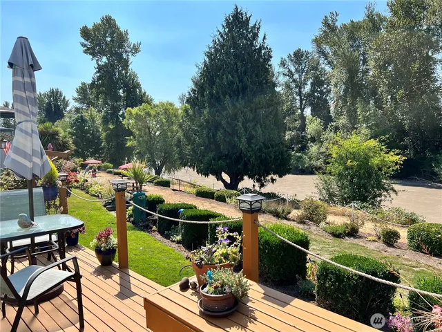 a view of a table and chairs on the roof deck