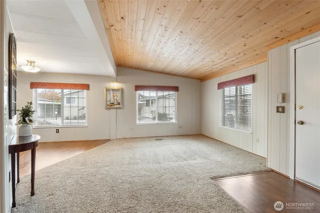 workspace with wooden floor and mirror