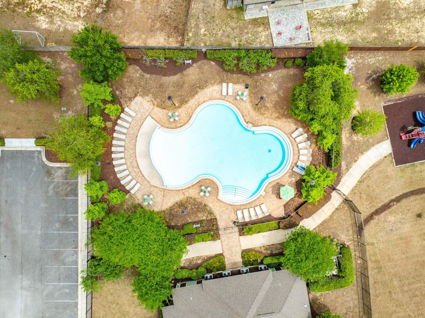 656 Teal Street Crestview, FL 32539 - Photo 12 of 58 an aerial view of a swimming pool