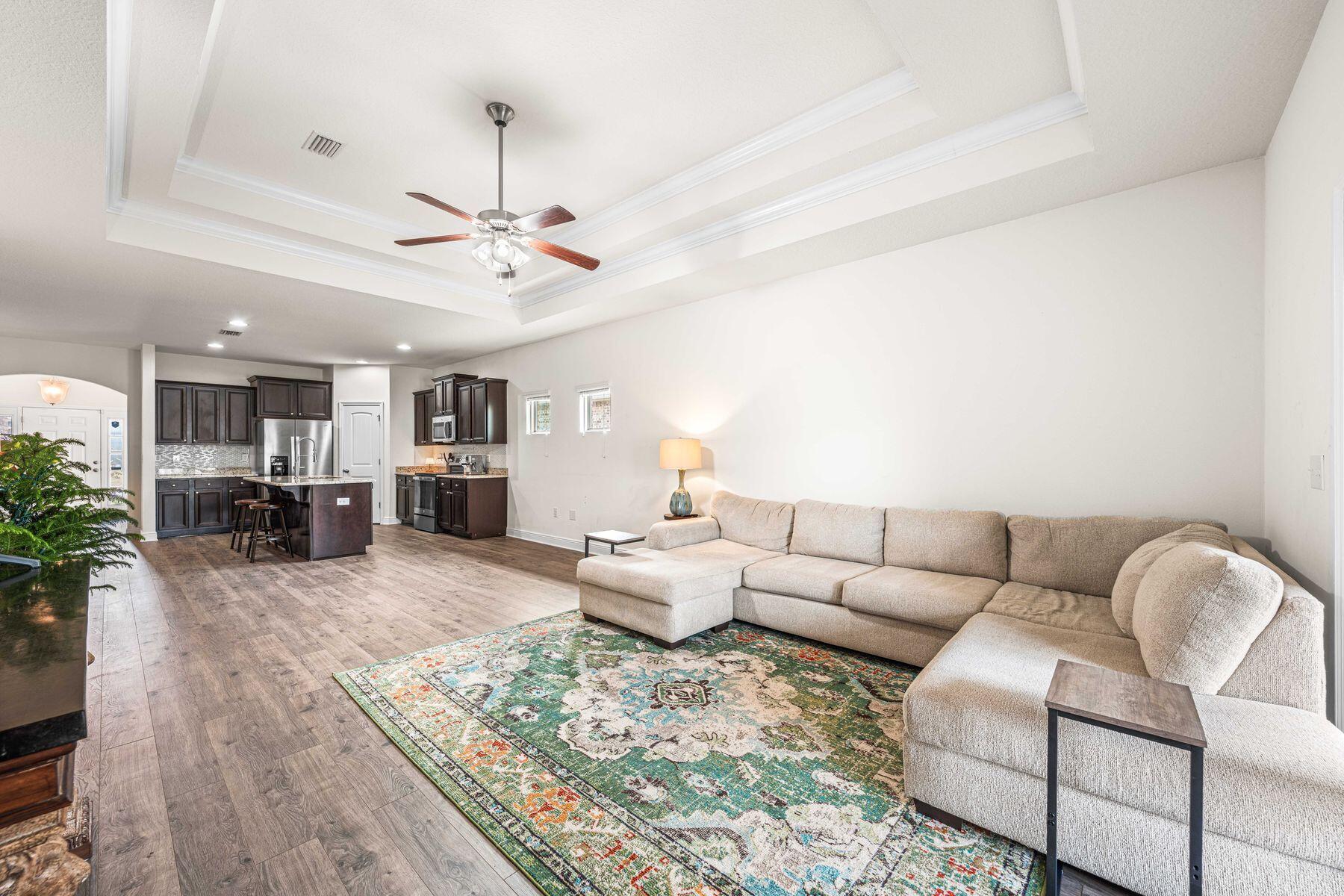 656 Teal Street Crestview, FL 32539 - Photo 58 of 58 a living room with furniture and white walls