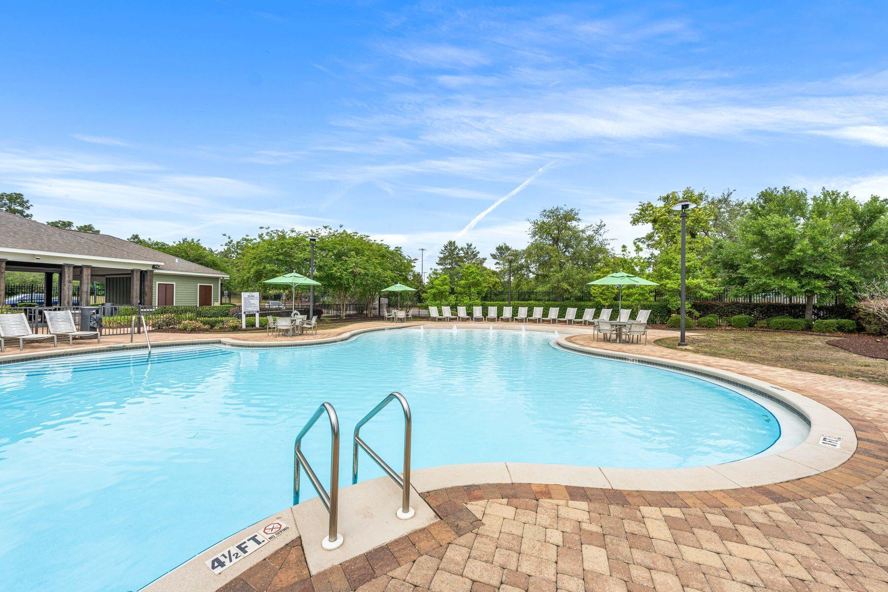 656 Teal Street Crestview, FL 32539 - Photo 42 of 58 a view of a swimming pool from a balcony