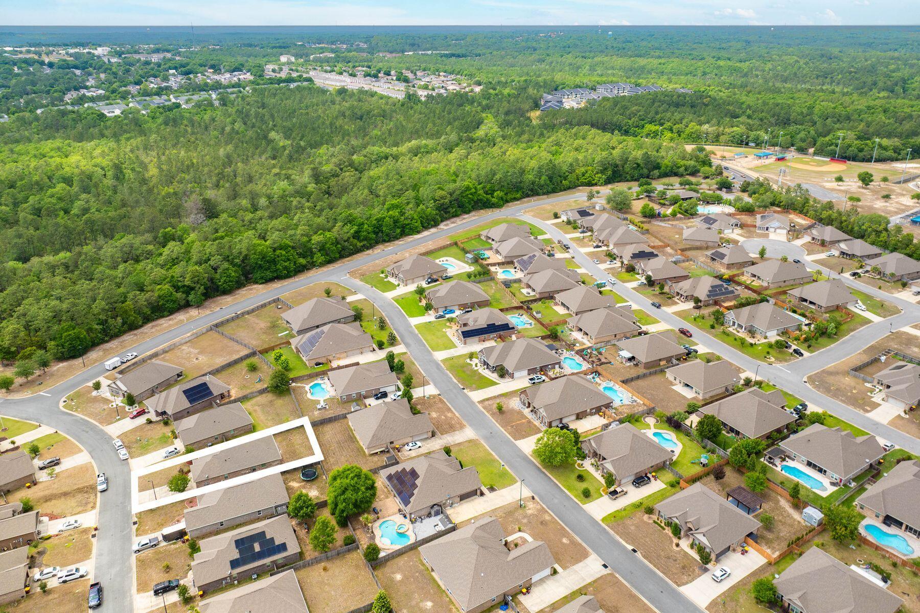 656 Teal Street Crestview, FL 32539 - Photo 54 of 58 an aerial view of multiple house