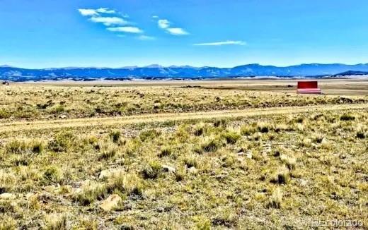 65 Veery Way Como, CO 80432 - Photo 5 of 17 a view of a large body of water with a building in the background