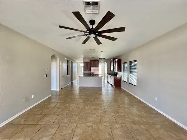 a view of a livingroom with a ceiling fan
