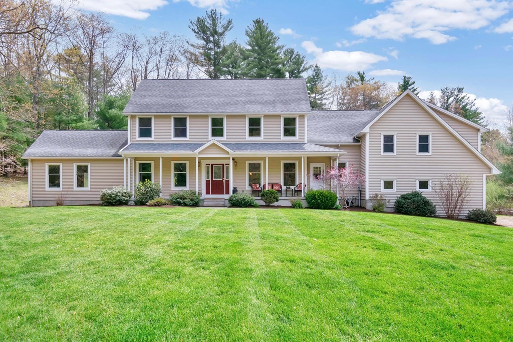 a view of a yard in front of a house