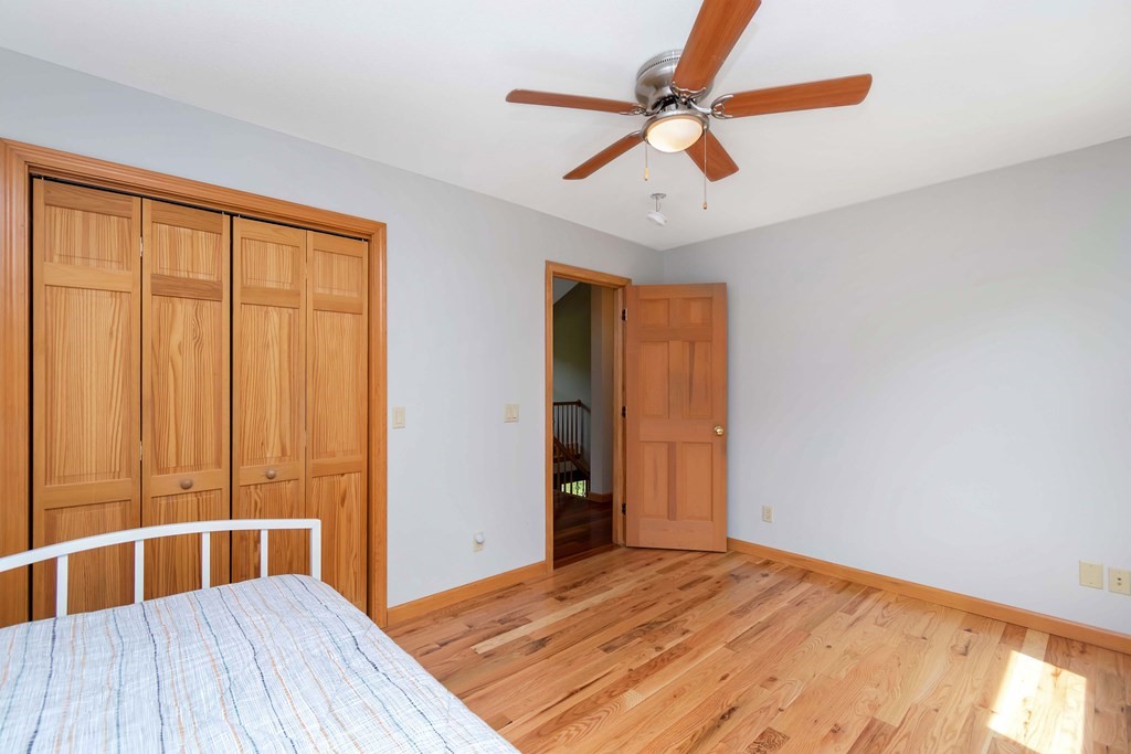 11 Maxwell Road Monson, MA 01057 - Photo 30 of 41 a bedroom with a bed and a large window