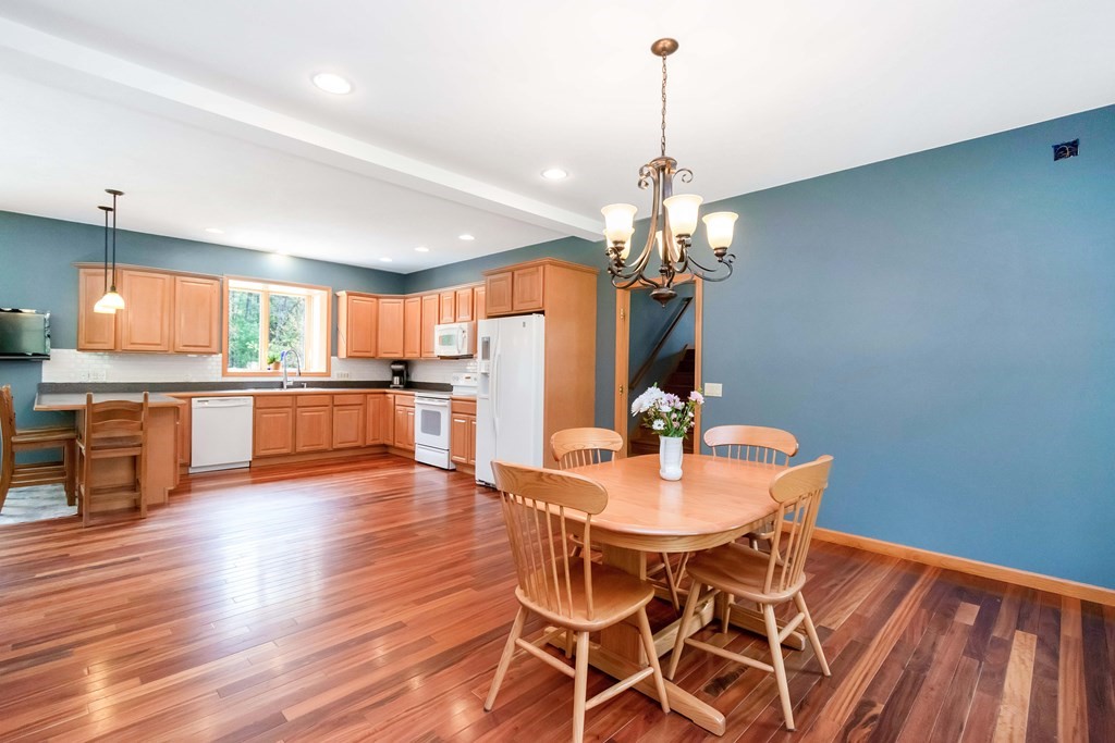 11 Maxwell Road Monson, MA 01057 - Photo 5 of 41 a view of a dining room with furniture and wooden floor