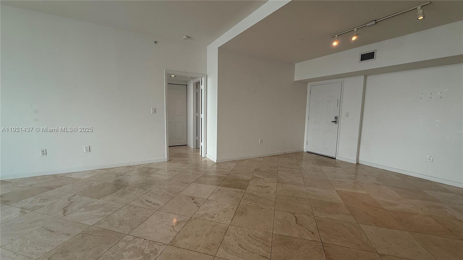 1155 Brickell Bay Drive, Unit PH104 Miami, FL 33131 - Photo 11 of 35 a view of an empty room