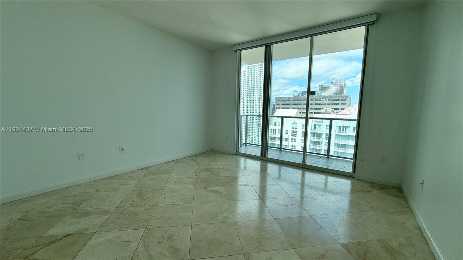 1155 Brickell Bay Drive, Unit PH104 Miami, FL 33131 - Photo 14 of 35 a view of an empty room and window