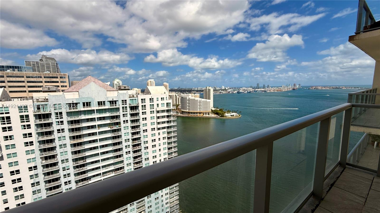 1155 Brickell Bay Drive, Unit PH104 Miami, FL 33131 - Photo 28 of 35 a view of a lake with a city skyline in the background